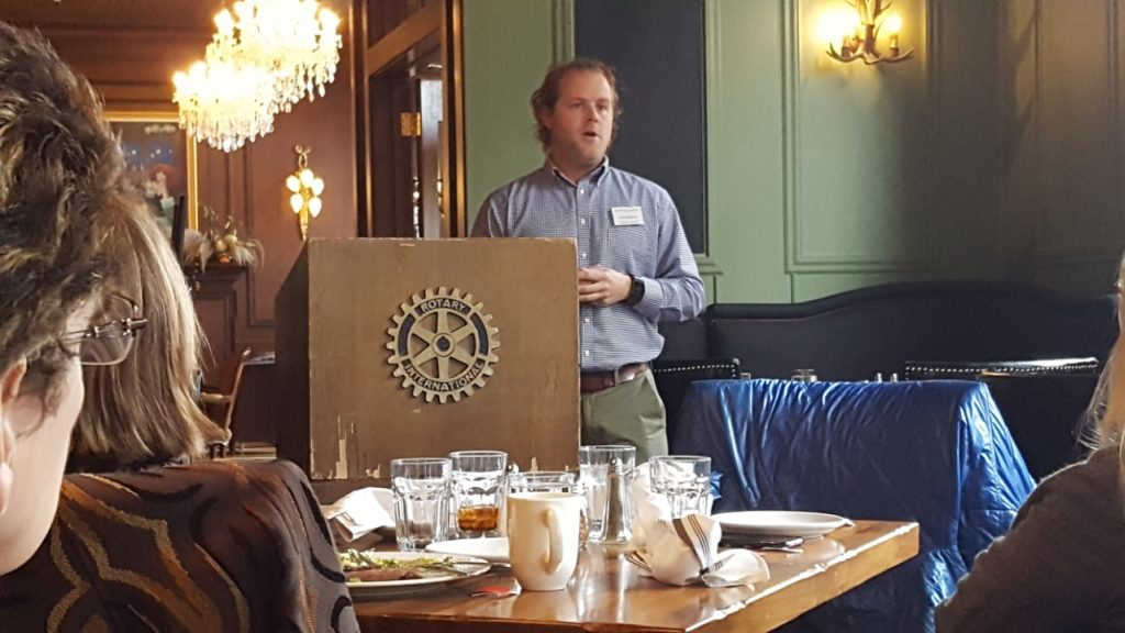 Alzheimer's Assocation Regional Director Jake Bilodeau speaking at the Marquette West Rotary Luncheon.